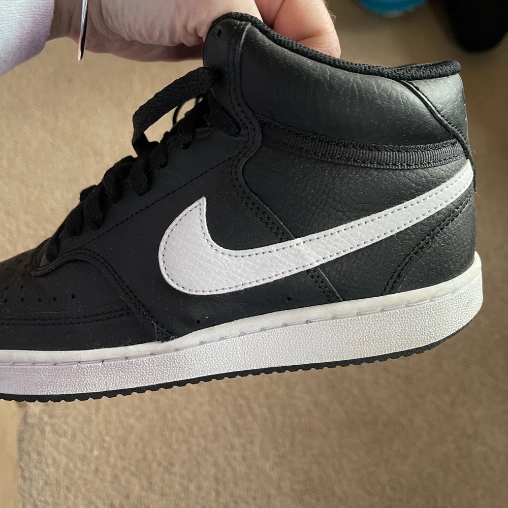 Nikes black high tops
